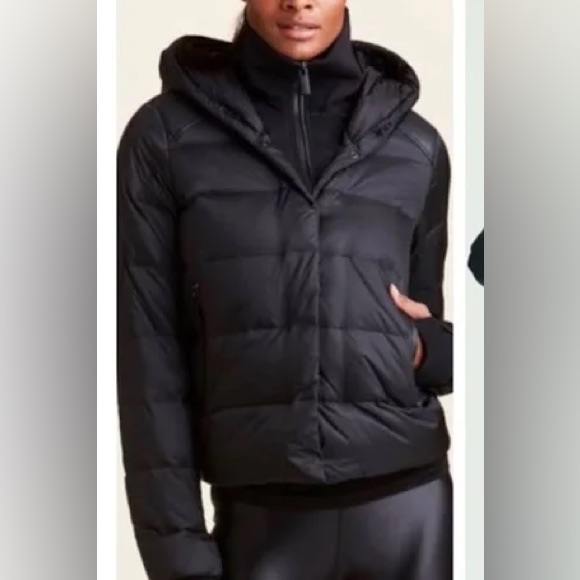 Alala Puffer Jacket Features A Sleek Black Design